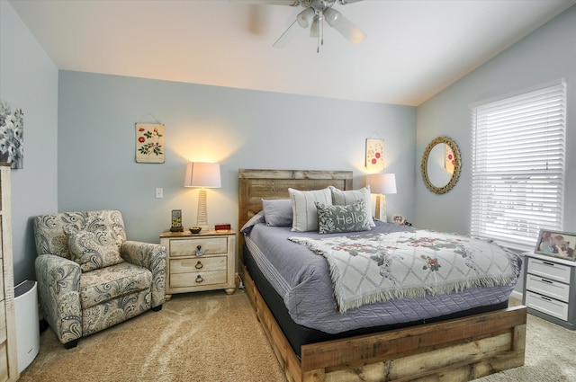 bedroom with vaulted ceiling, carpet, and ceiling fan