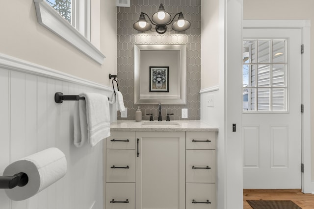 bathroom featuring vanity and wood-type flooring