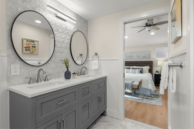 bathroom with vanity and ceiling fan