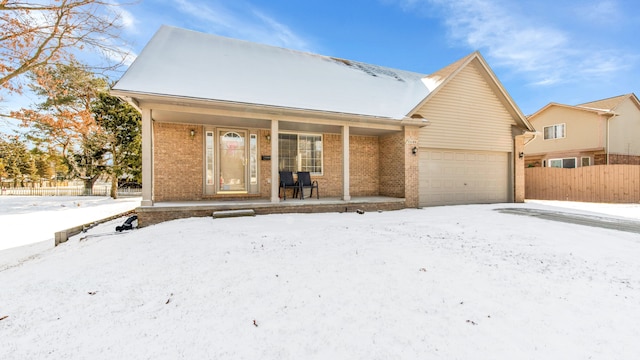 view of front facade featuring a garage and a porch