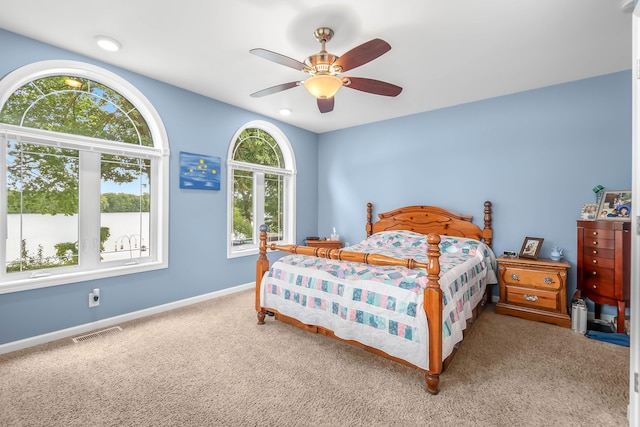 bedroom featuring ceiling fan and carpet flooring