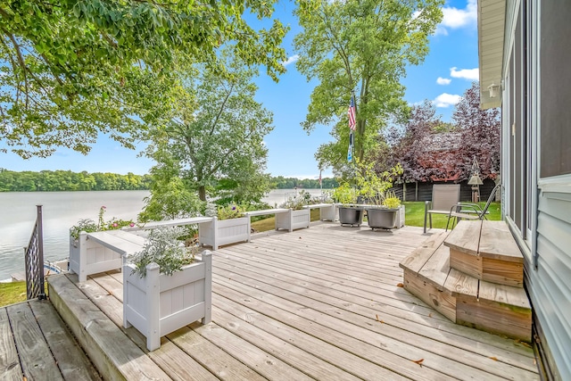 deck featuring a water view