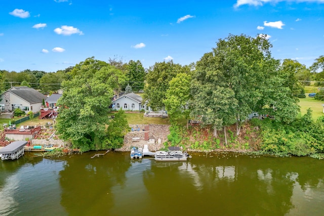 birds eye view of property featuring a water view