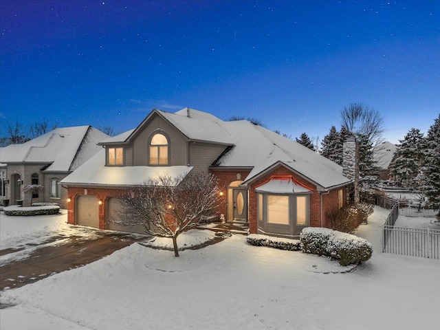 view of front of home with a garage