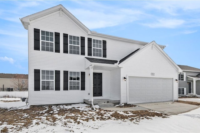 view of front of property with a garage