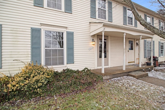 entrance to property with covered porch