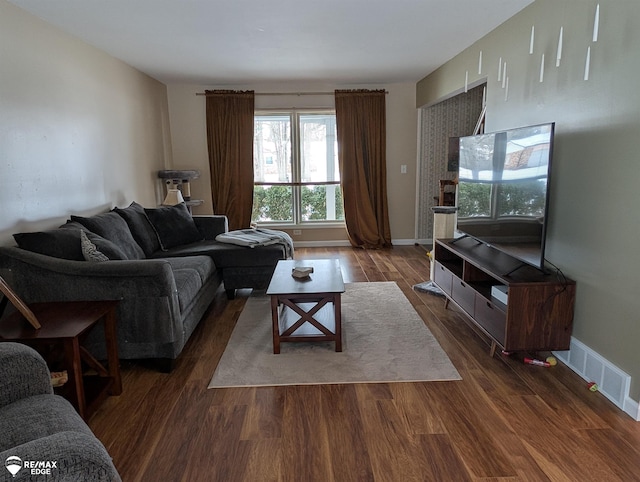 living room featuring dark hardwood / wood-style floors