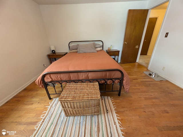 bedroom with light wood-type flooring