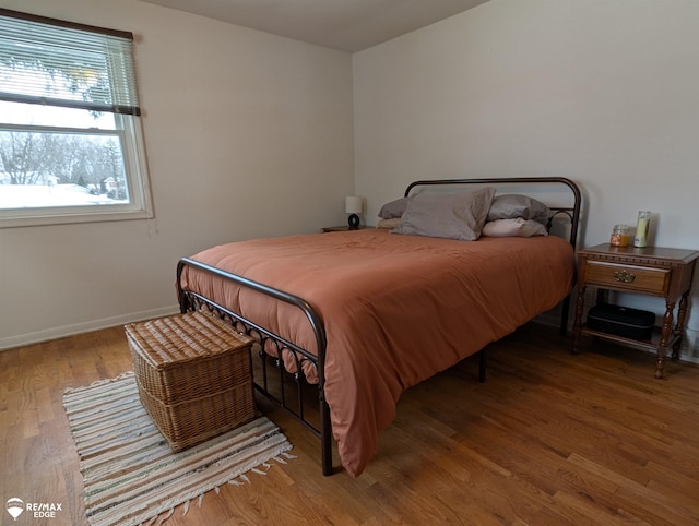 bedroom featuring hardwood / wood-style floors