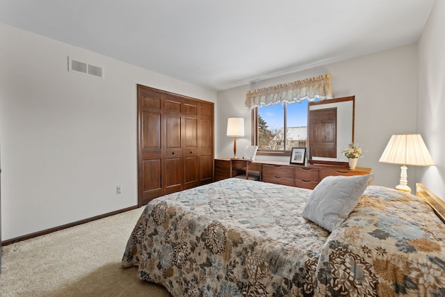 carpeted bedroom featuring a closet