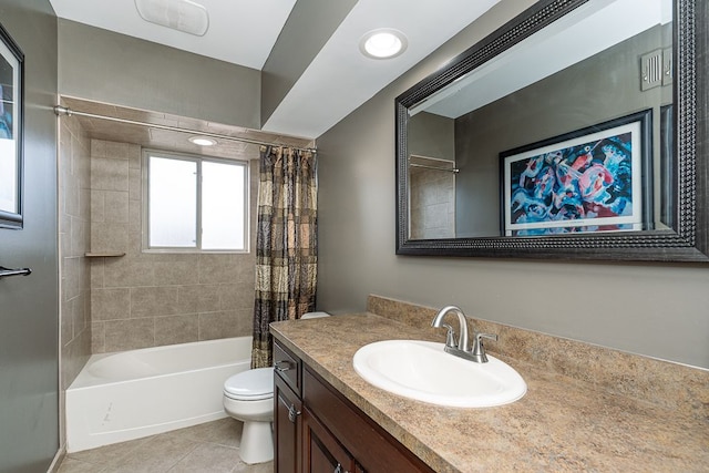 full bathroom featuring toilet, tile patterned floors, vanity, and shower / bathtub combination with curtain