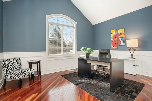 office with dark hardwood / wood-style flooring and vaulted ceiling