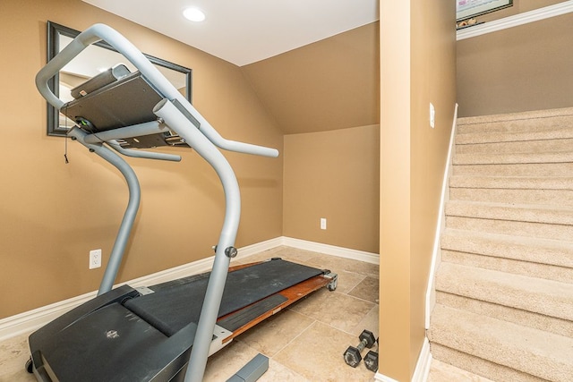 workout area featuring lofted ceiling