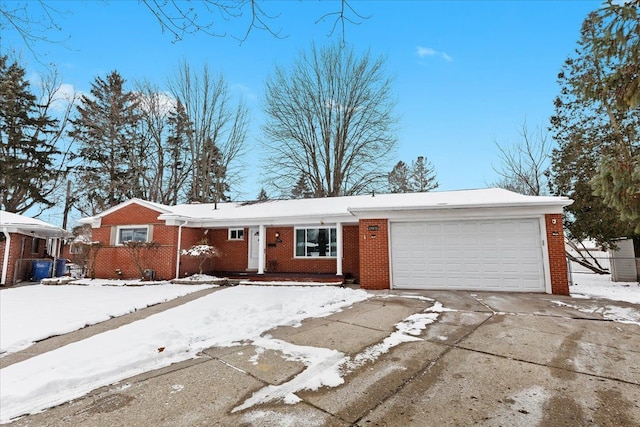 single story home with a garage