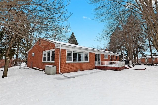 view of front of home featuring a wooden deck