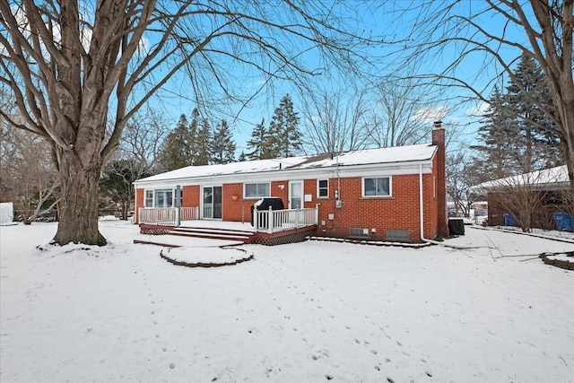 view of front of house with a wooden deck