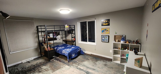 bedroom featuring dark wood-type flooring