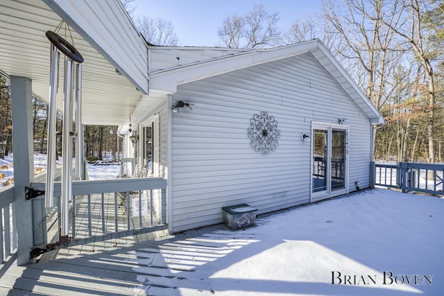 view of snow covered deck