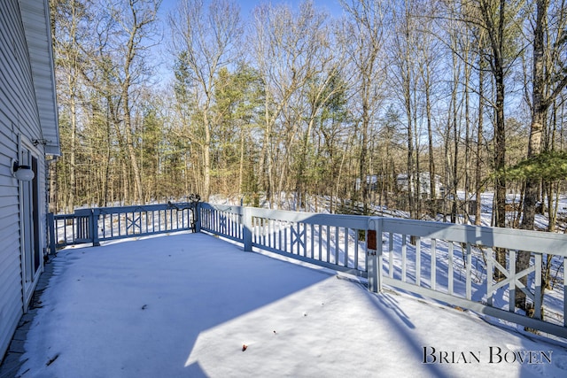 view of snow covered deck