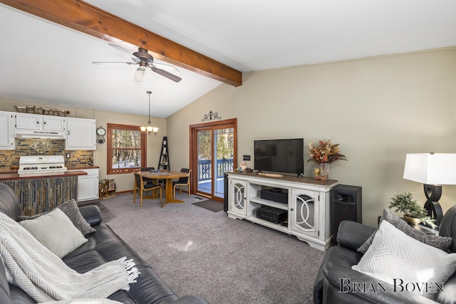 living room with vaulted ceiling with beams, dark carpet, and ceiling fan with notable chandelier