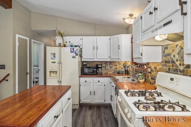 kitchen with white cabinetry, sink, wooden counters, and white appliances