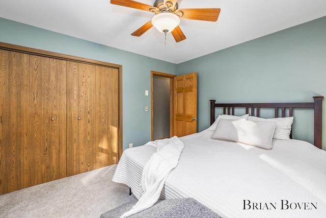 bedroom featuring ceiling fan, carpet, and a closet