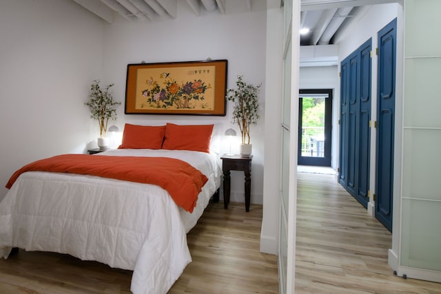 bedroom with light wood-type flooring