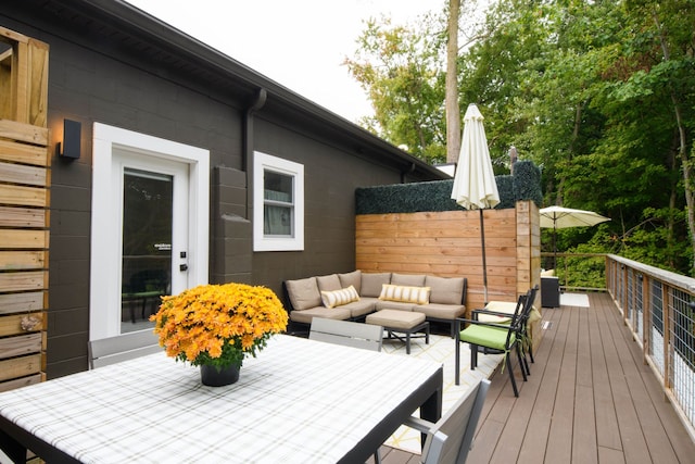 deck with an outdoor hangout area