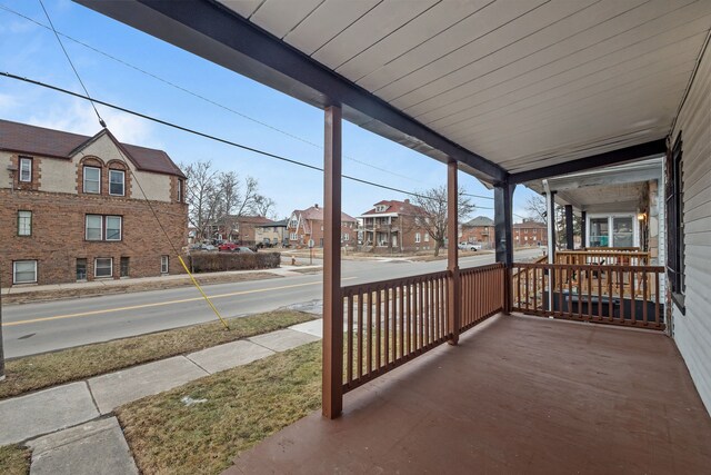 exterior space with a residential view and a porch