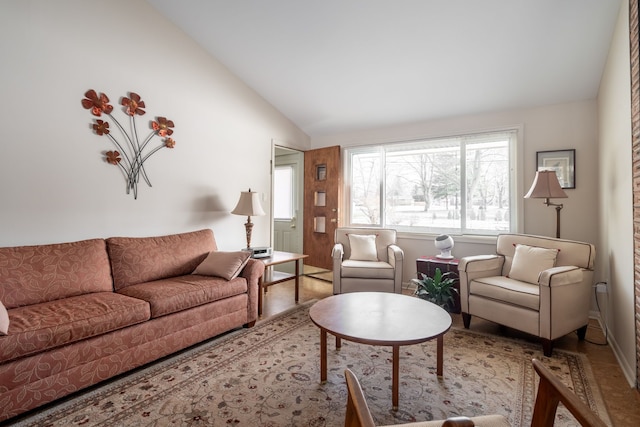 living area with vaulted ceiling