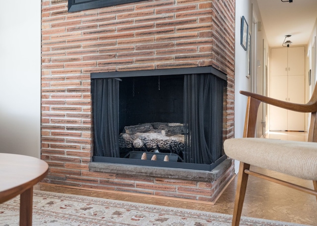 interior details featuring a multi sided fireplace