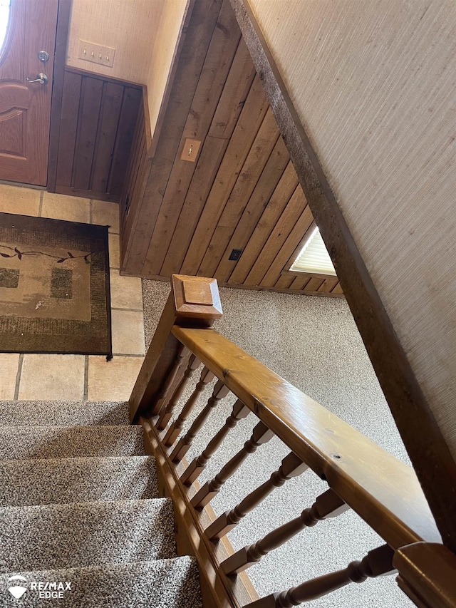 staircase with beamed ceiling and wood ceiling