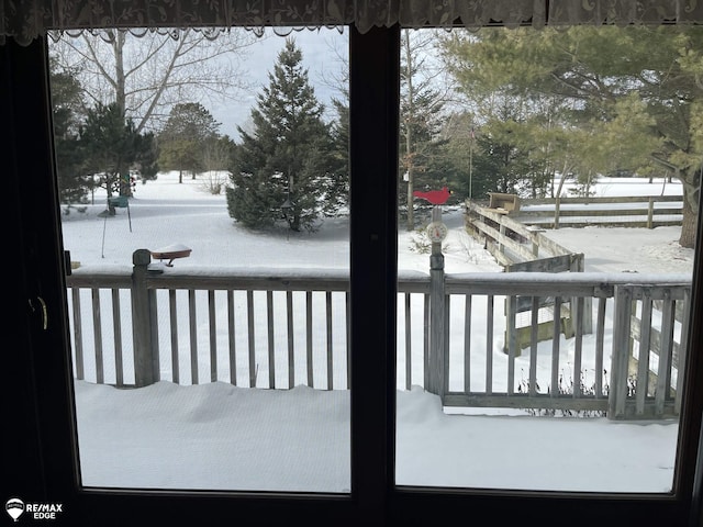 view of snow covered deck