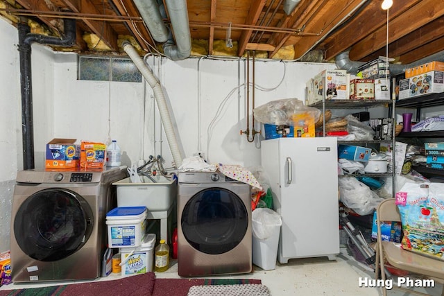 laundry room featuring washer / clothes dryer and sink