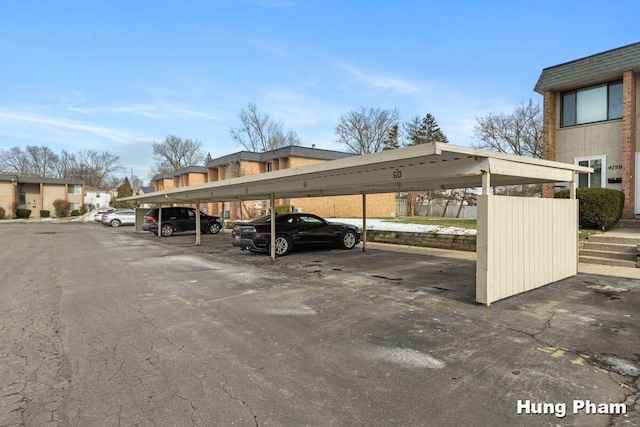 view of car parking with a carport