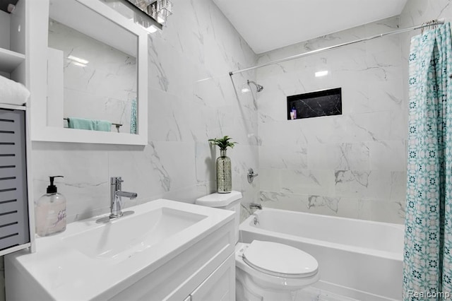 full bathroom with tasteful backsplash, tile walls, vanity, toilet, and shower / bath combo