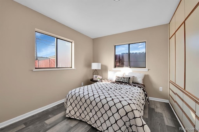 bedroom featuring dark hardwood / wood-style floors