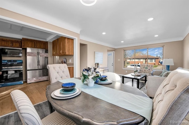 dining area featuring hardwood / wood-style flooring