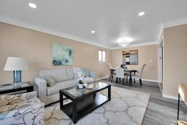 living room with light hardwood / wood-style floors