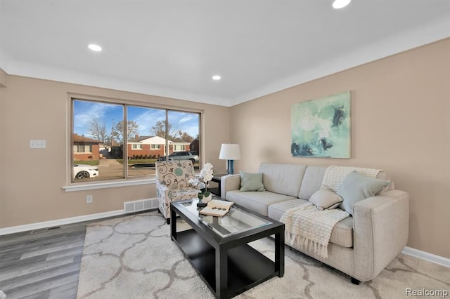 living room with hardwood / wood-style flooring