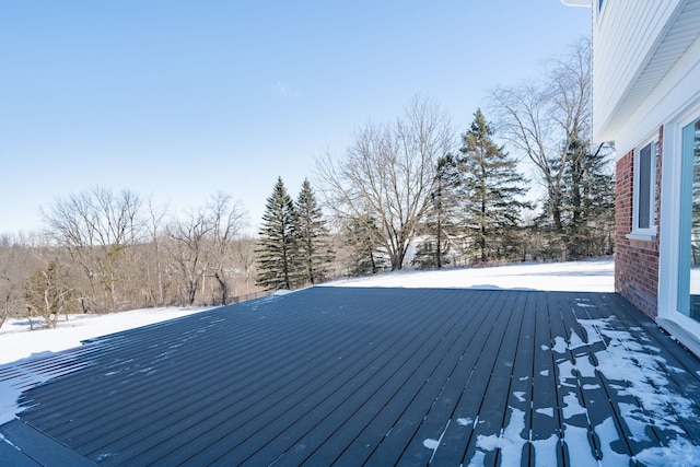 view of snow covered deck