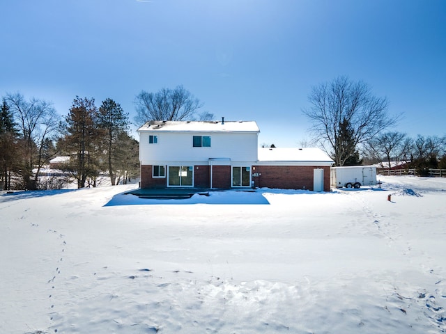 view of front of home with brick siding