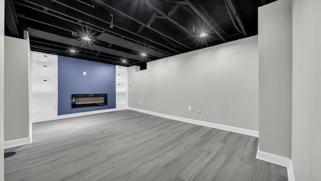 basement featuring wood-type flooring