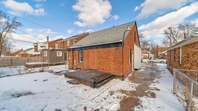 view of snow covered property