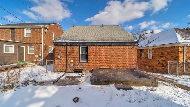 view of snow covered house