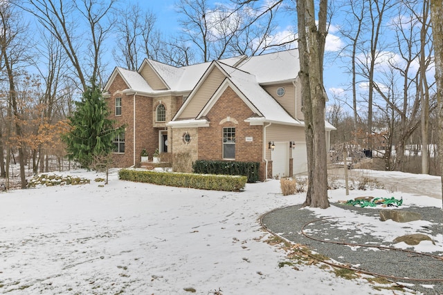 view of front of home featuring brick siding