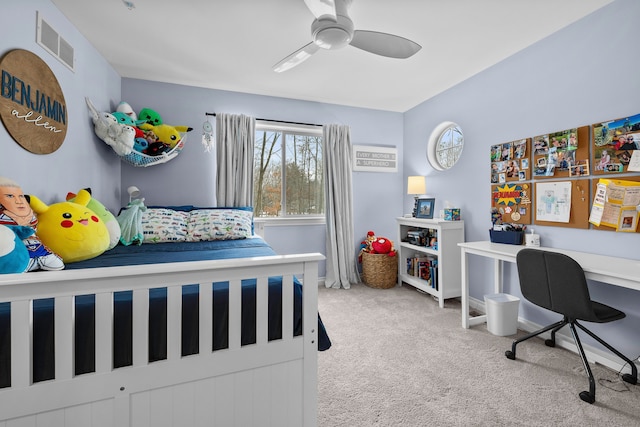 bedroom with ceiling fan, visible vents, and light colored carpet