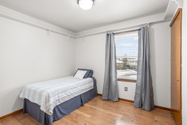 bedroom with light hardwood / wood-style flooring