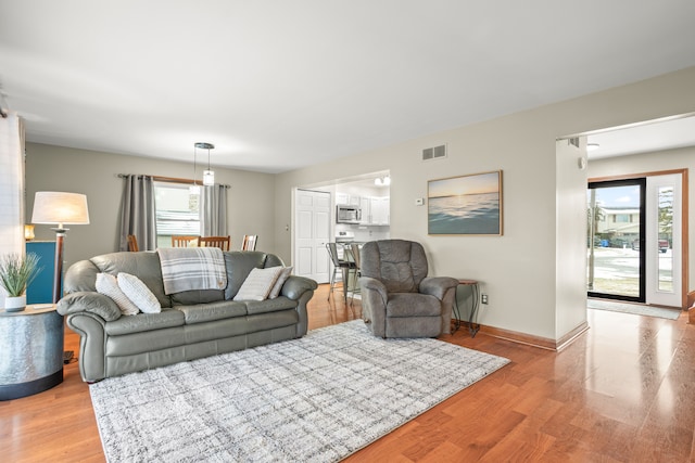 living room with light wood-type flooring