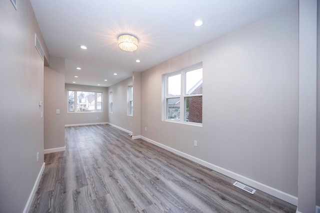 unfurnished room featuring light hardwood / wood-style flooring